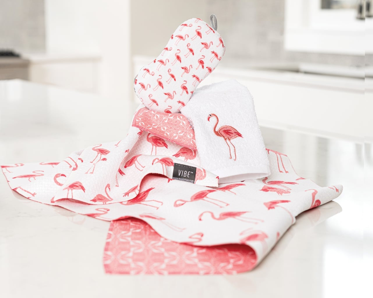 Floral-patterned fabric with a brand label on a white surface